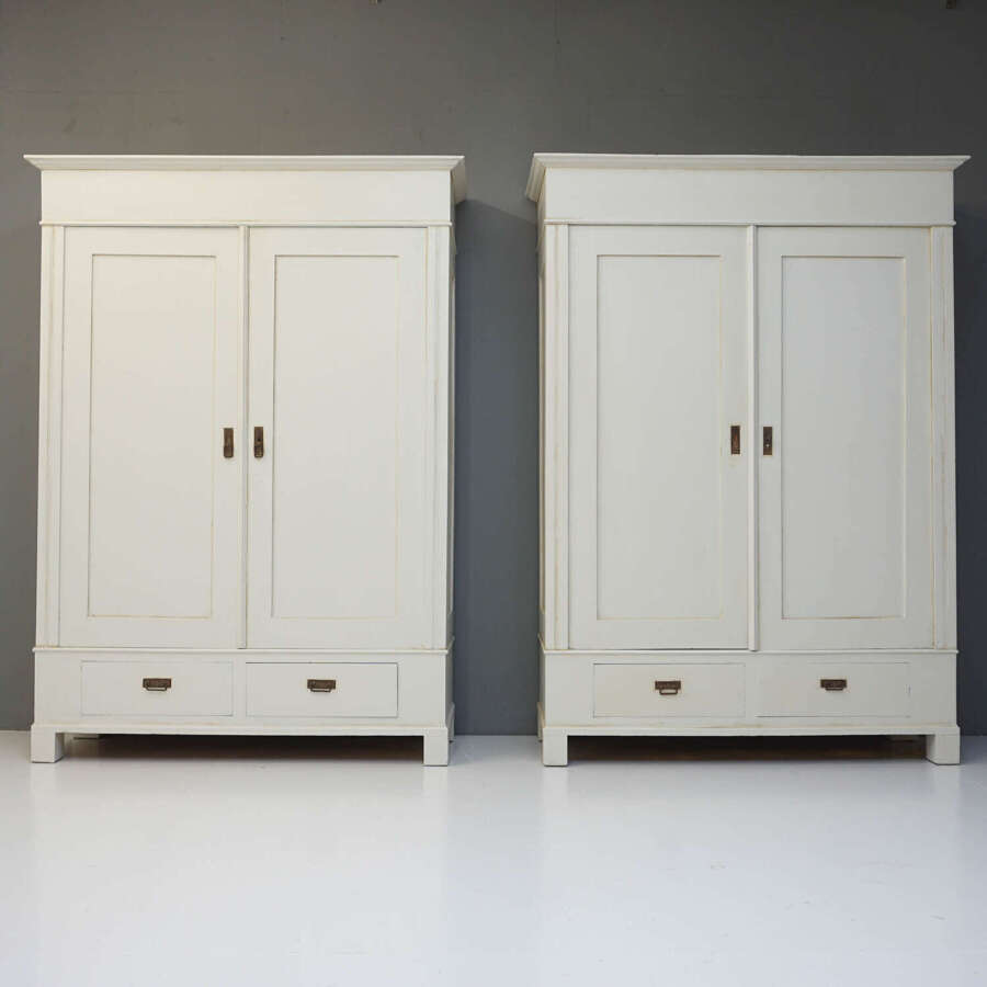 Pair of antique Continental wardrobes (knockdown)